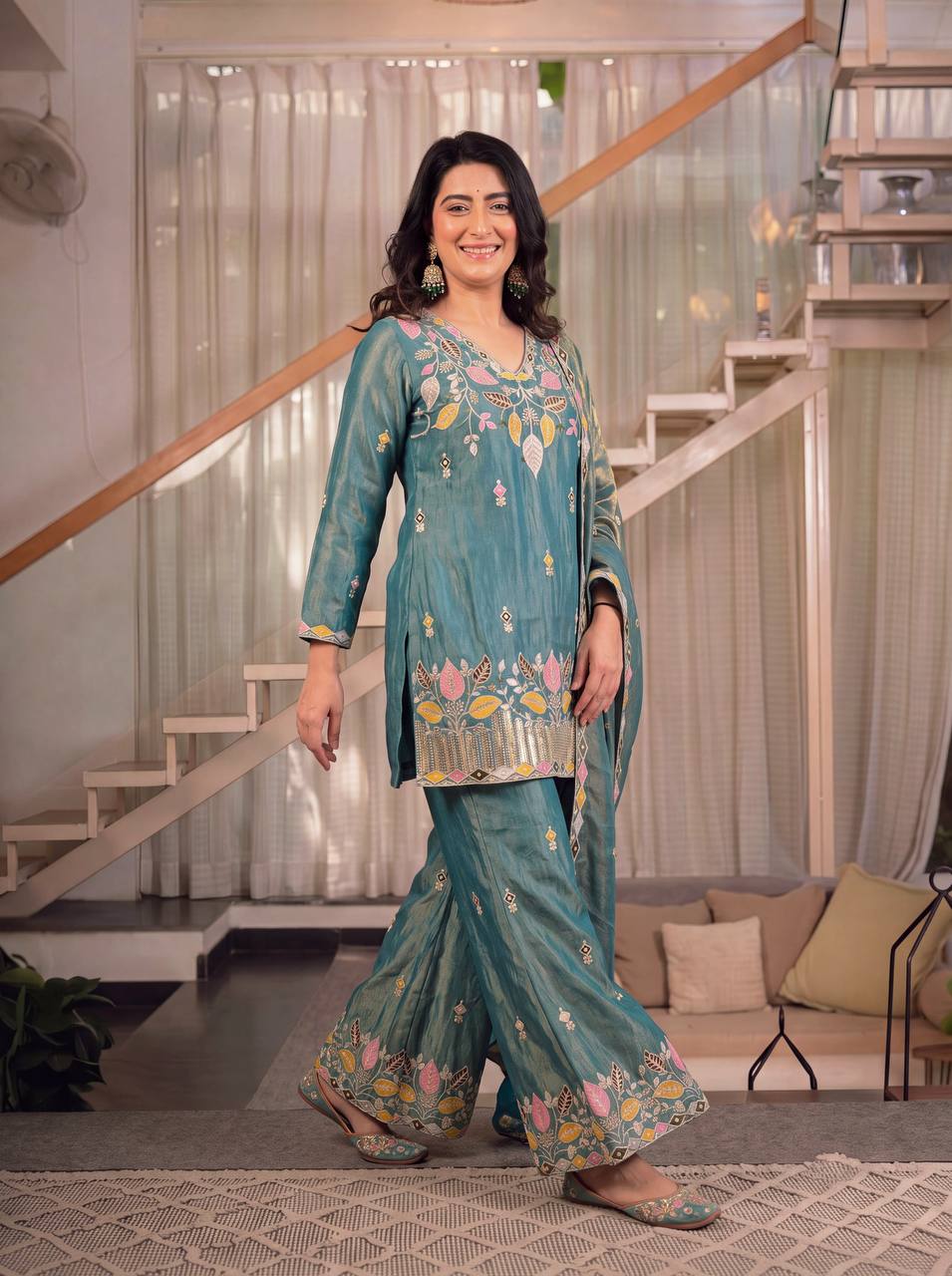 Elegant Rust Orange Silk Kurta and Flared Palazzo Set Adorned with Intricate Multicolored Botanical Embroidery and Mirror Work